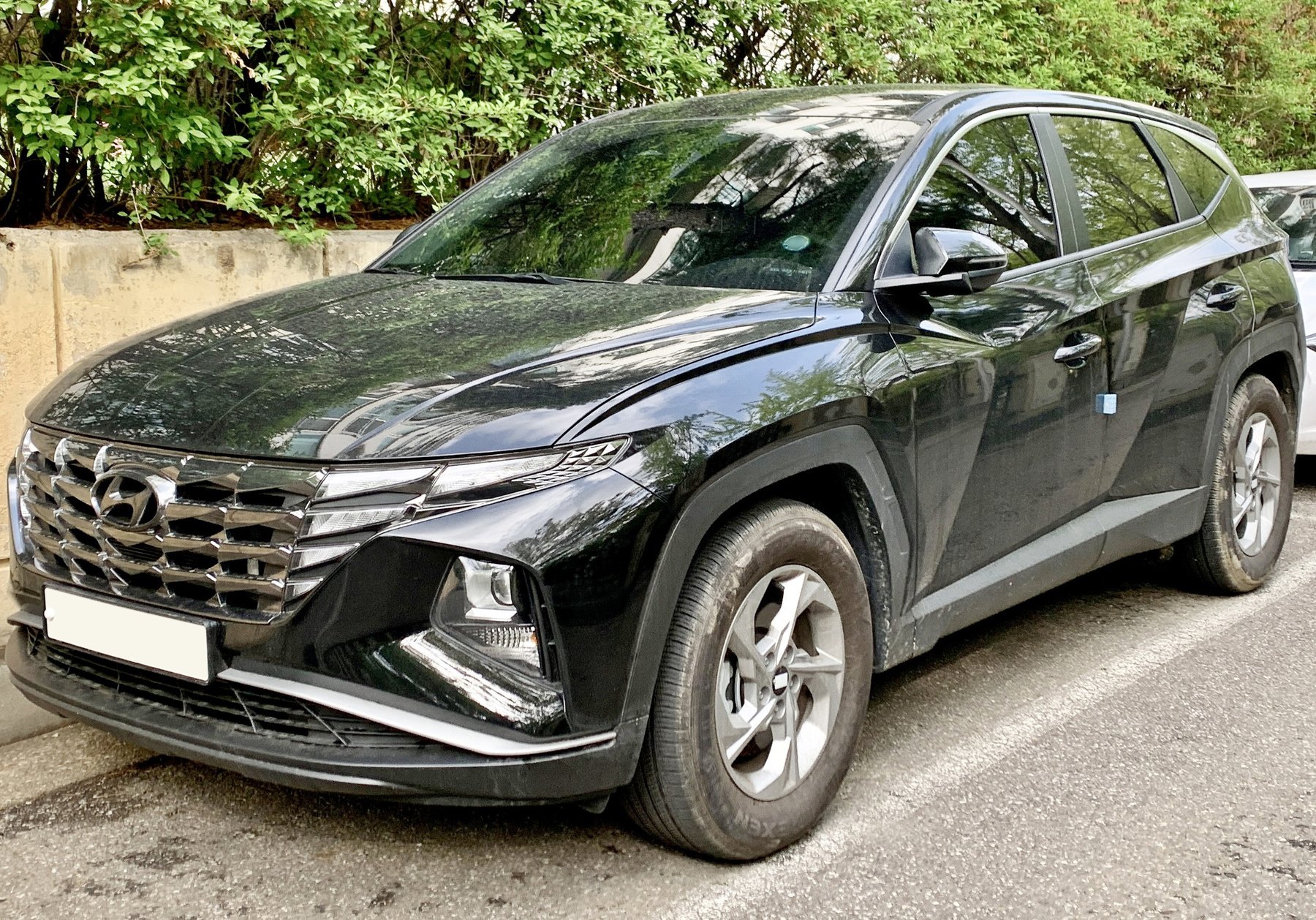 Hyundai Tucson NX4 arkadan görünüm
